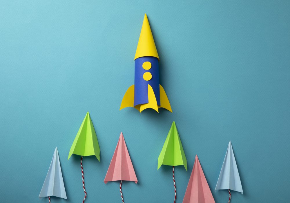 top-view-space-rocket-small-paper-planes